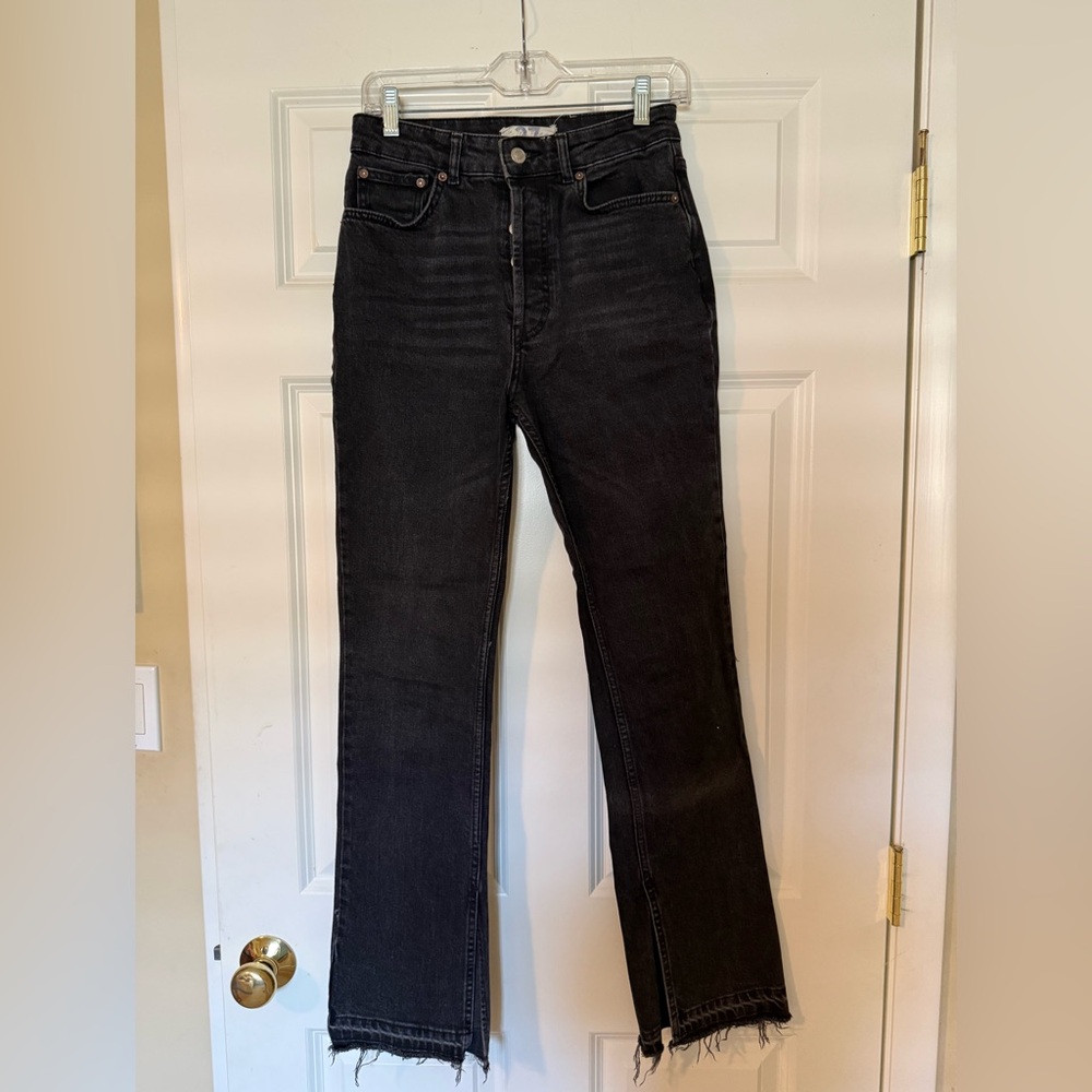 We The Free Washed Black Flare Jeans with Raw Hem